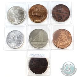 Group Lot of Sudbury Medallions. You will receive 4 different designs, 3 of which have the same desi