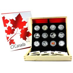 2013 O Canada $10 12-Coin Fine Silver Set in Deluxe Box (Beaver coin is toned & capsule scratched). 