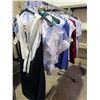 Image 2 : ROLLING RACK OF SET COSTUMES GLOVES, FLIGHT ATTENDANT SUITS AND WOMEN'S COSTUMES VARIOUS SIZES