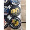 Image 2 : COLLECTION OF NINE SIGNED HOCKEY PUCKS, INCLUDES GLENN HALL, PAT QUINN, HENRIK & DANIEL SEDIN,