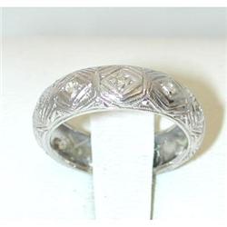 1007 18KW Gold Ring w/ Diamonds
