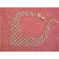 1163 14k Yellow and White Gold Bracelet