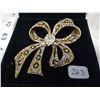 Image 2 : LARGE GOLD TONE AND RHINESTONE BROACH
