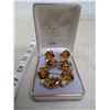 Image 1 : GOLD TONE AND AMBER RHINESTONE BROACH AND EARRING SET