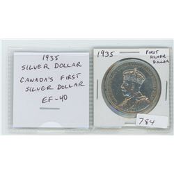 1935 SILVER DOLLAR. CANADA'S FIRST SILVER DOLLAR AND ALSO CANADA'S FIRST COMMEMORATIVE COIN, CELEBRA