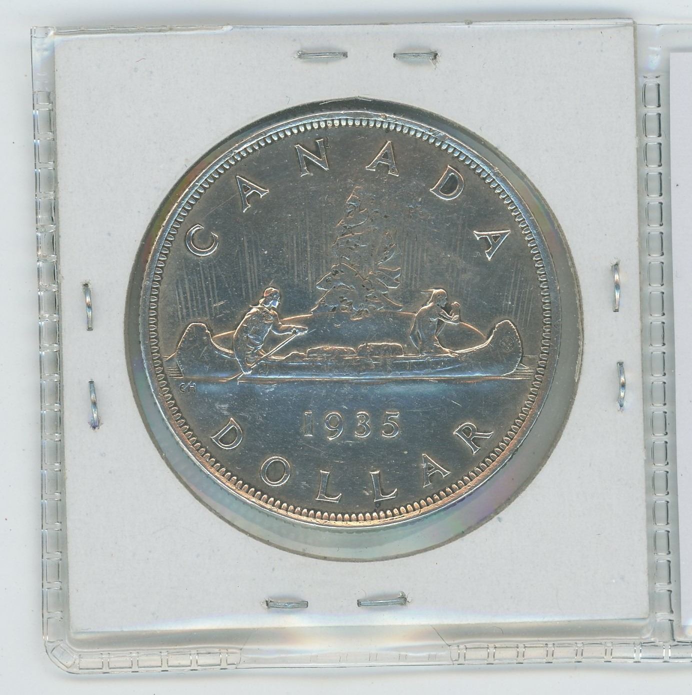 1935 SILVER DOLLAR. CANADA'S FIRST SILVER DOLLAR AND ALSO CANADA'S