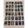 Image 11 : PRIVATE COLLECTOR FROM AN ESTATE BINDER OF FOOTBALL CARDS 78 SHEETS OF 6 SEE PHOTOS