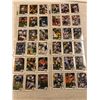 Image 12 : PRIVATE COLLECTOR FROM AN ESTATE BINDER OF FOOTBALL CARDS 78 SHEETS OF 6 SEE PHOTOS