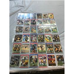PRIVATE COLLECTOR FROM AN ESTATE BINDER OF FOOTBALL CARDS 100 SHEETS OF 9 PHOTOS