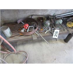 ASSORTED SCRAP STEEL, WHEELS, ETC UNDER BENCH