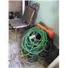 Image 1 : PILE OF HOSES, EXTENSION CORDS, TARP, MOTOR, CHAIR, METAL FRAMES, ETC