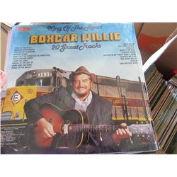 BOX OF ASSORTED RECORDS & VHS TAPES