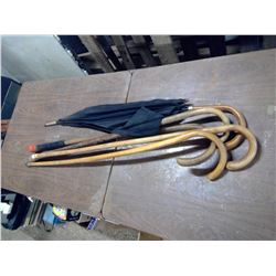 4 CANES AND AN UMBRELLA