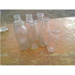 7 Milk Bottles (2 With Advertising)