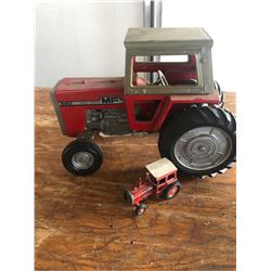 TRACTORS 2 OF THEM ONE TALL ONE MINI ( FIGURINE )