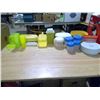 Image 1 : A BUNCH OF TUPPERWARE CONTAINERS AND RUBBER MADE KITCHEN SUPPLIES