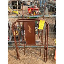 METAL DOLL BED WITH RABBIT ON IT