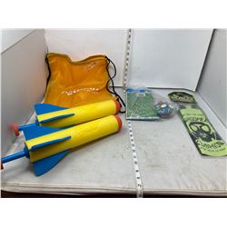 NERF ROCKET + GAG GAME  + SOCCER GAME IN YELLOW BAG
