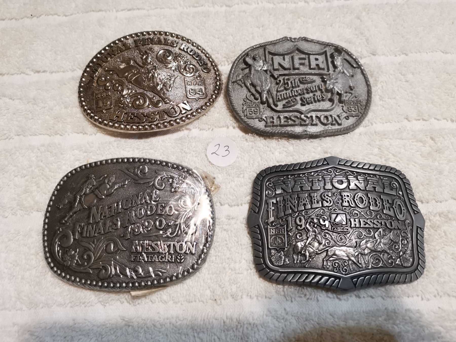 HESSTON NATIONAL RODEO FINALS BELT BUCKLES LOT