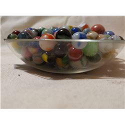COLORFUL OLD MARBLES ON GLASS PLATE
