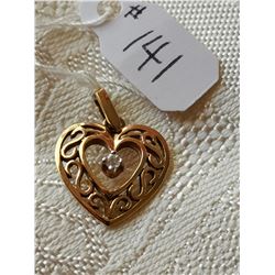 10kt heart pendant with diamond chip