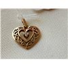 Image 3 : 10kt heart pendant with diamond chip