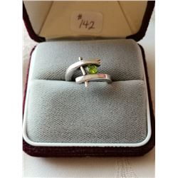Sterling silver ring with peridot coloured stone, size 7