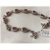 Image 2 : Silver tone tennis bracelet with amethysts & safety, 7”