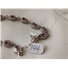 Image 3 : Silver tone tennis bracelet with amethysts & safety, 7”