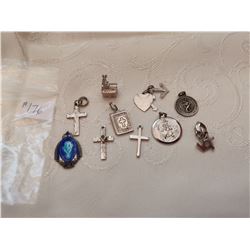 Lot of Sterling religious charms (10)