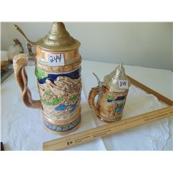 VINTAGE LIDDED STEINS ONE MUSICAL OVER WOUND