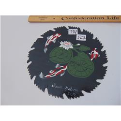 GERRIC NELSON COY AND WATER LILLIES ON OLD SAW BLADE