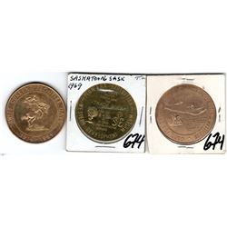 THREE VINTAGE SASKATCHWAN TRADE DOLLARS