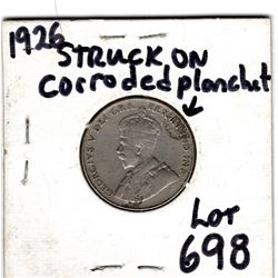 1926 NEAR 6 5 CENT STRUCK ON CORRODED PLANCHET