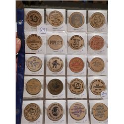 LOT OF WOODEN TOKENS, FULL PAGE OF 20