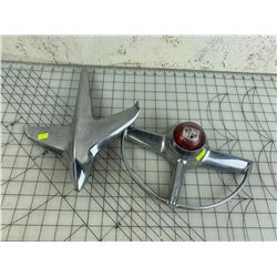 HOOD ORNAMENT AND STEERING WHEEL PIECE