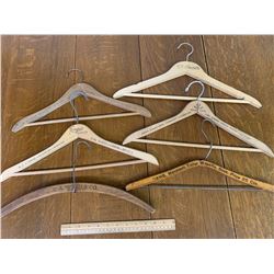 LOT OF WOODEN ADVERTISING COAT HANGERS