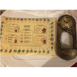 443-TUPPERWARE PLANTER CLOCK WITH TUPPERWARE PLANT CARE SHEET