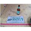 Image 1 : ROUGH RIDER LICENSE PLATE AND RIDER PRIDE BEER BOTTLE