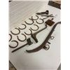 Image 1 : large lot- horse related item, horse shoes, brush, wrench, harness hook, etc.