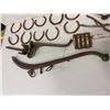 Image 4 : large lot- horse related item, horse shoes, brush, wrench, harness hook, etc.