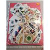 Image 1 : double sided pakage of stamps, Canadian, U.S. & worldwide