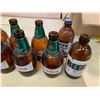 Image 2 : 12 VINTAGE SHORT NECK BEER BOTTLES