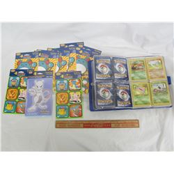 LOT OF POKEMON ARTICLES BOOK WITH CARDS AND 11 SEALED STICKER PACKS