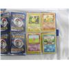 Image 2 : LOT OF POKEMON ARTICLES BOOK WITH CARDS AND 11 SEALED STICKER PACKS