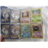 Image 3 : LOT OF POKEMON ARTICLES BOOK WITH CARDS AND 11 SEALED STICKER PACKS