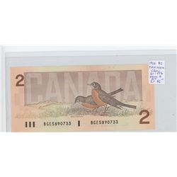 1986 $2 THIESSEN-CROW SIGNATURES, SMALL BGE PREFIX. BC-55B. UNC.