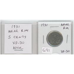1931 NEAR RIM NICKEL 5 CENTS. VF-30. NICE.