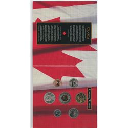 1987-1997 7-COIN FLYING LOON SET IN FOLDER OF ISSUE.