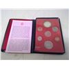 Image 2 : 1973 7-COIN PRESTIGE SPECIMEN SET IN CASE OF ISSUE. INCLUDES RCMP SILVER DOLLAR.